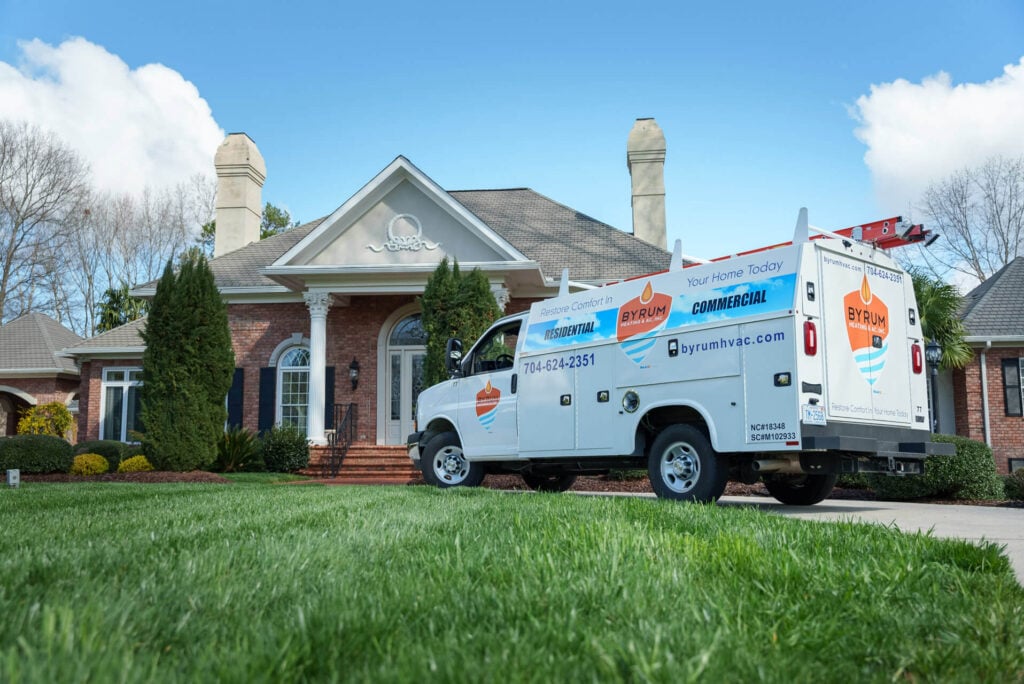 A Byrum Heating & AC service truck parked outside of a customer‘s home - Byrum Heating & AC A Byrum Heating & AC service truck parked outside of a customer‘s home in Marshville, NC